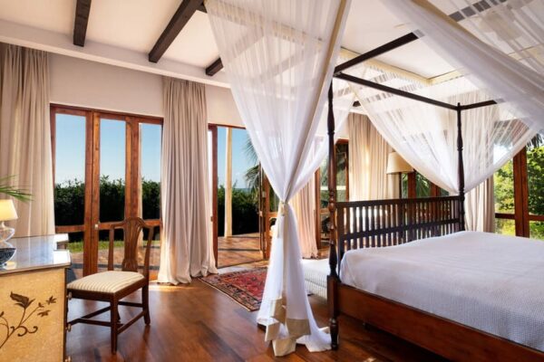 belle chambre ouverte sur l'exterieur d'une villa du Qambani Luxury Resort Zanzibar